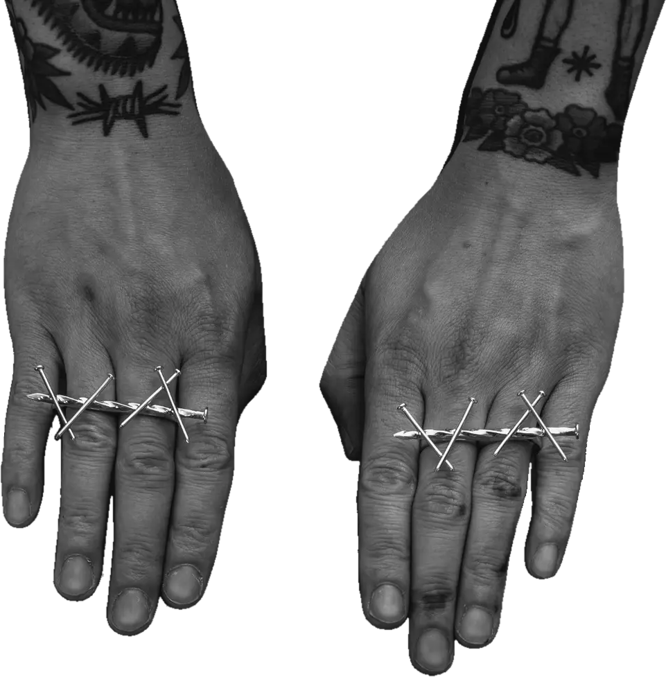 Two hands wearing Matti Crossed Nail Double Rings